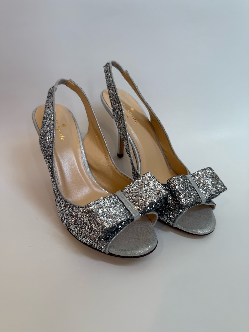 Kate Spade Silver Glitter Peep-Toe Bow Heels